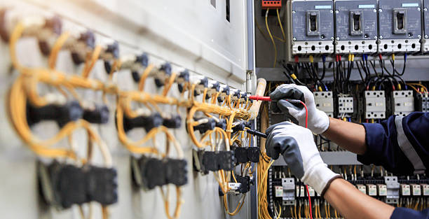Professional Electrician technician working in Okauchee Lake, WI